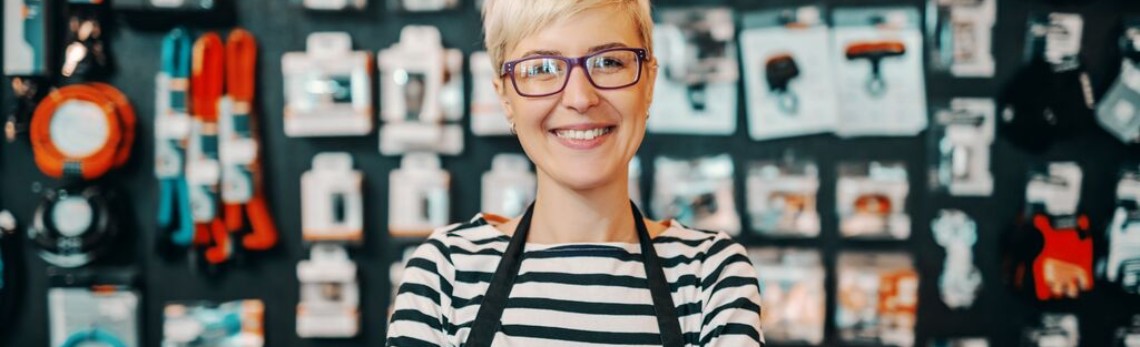 GLS business customer standing in front of her store