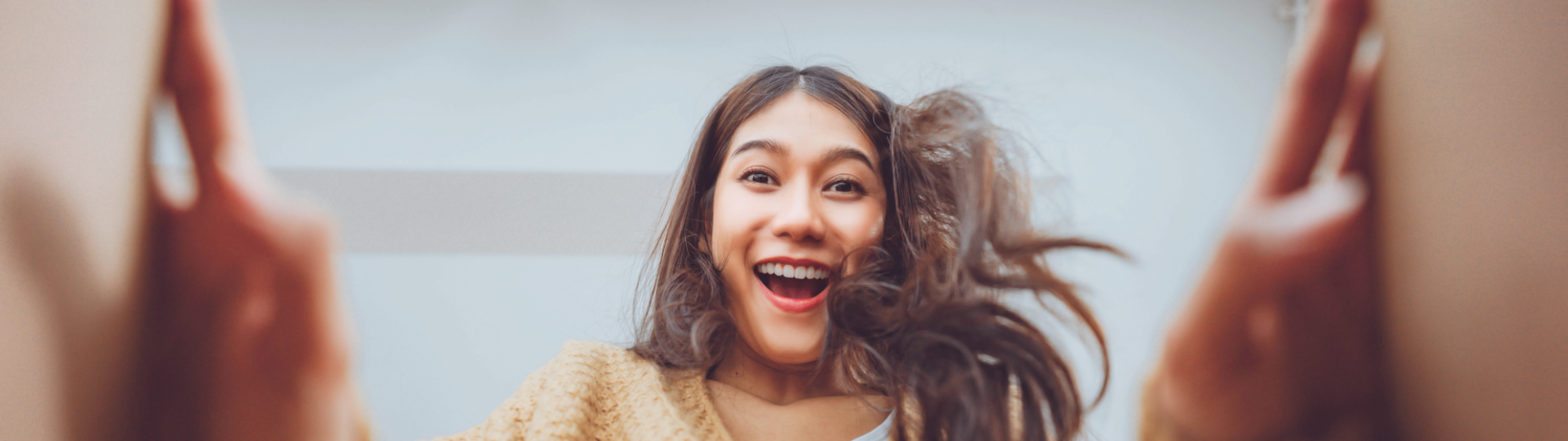 The girl opens a parcel from the courier