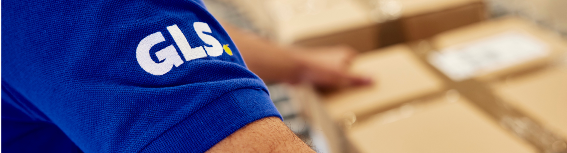 GLS driver grabbing a package